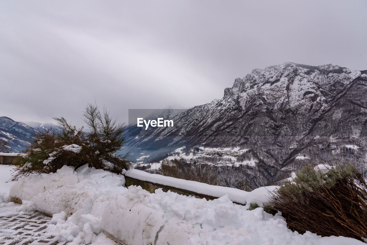 Snow covered mountain against sky