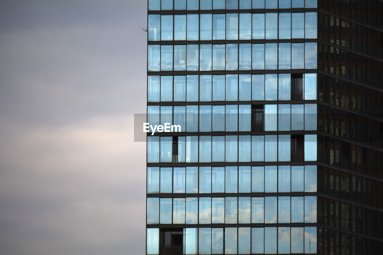 Low angle view of modern building against sky