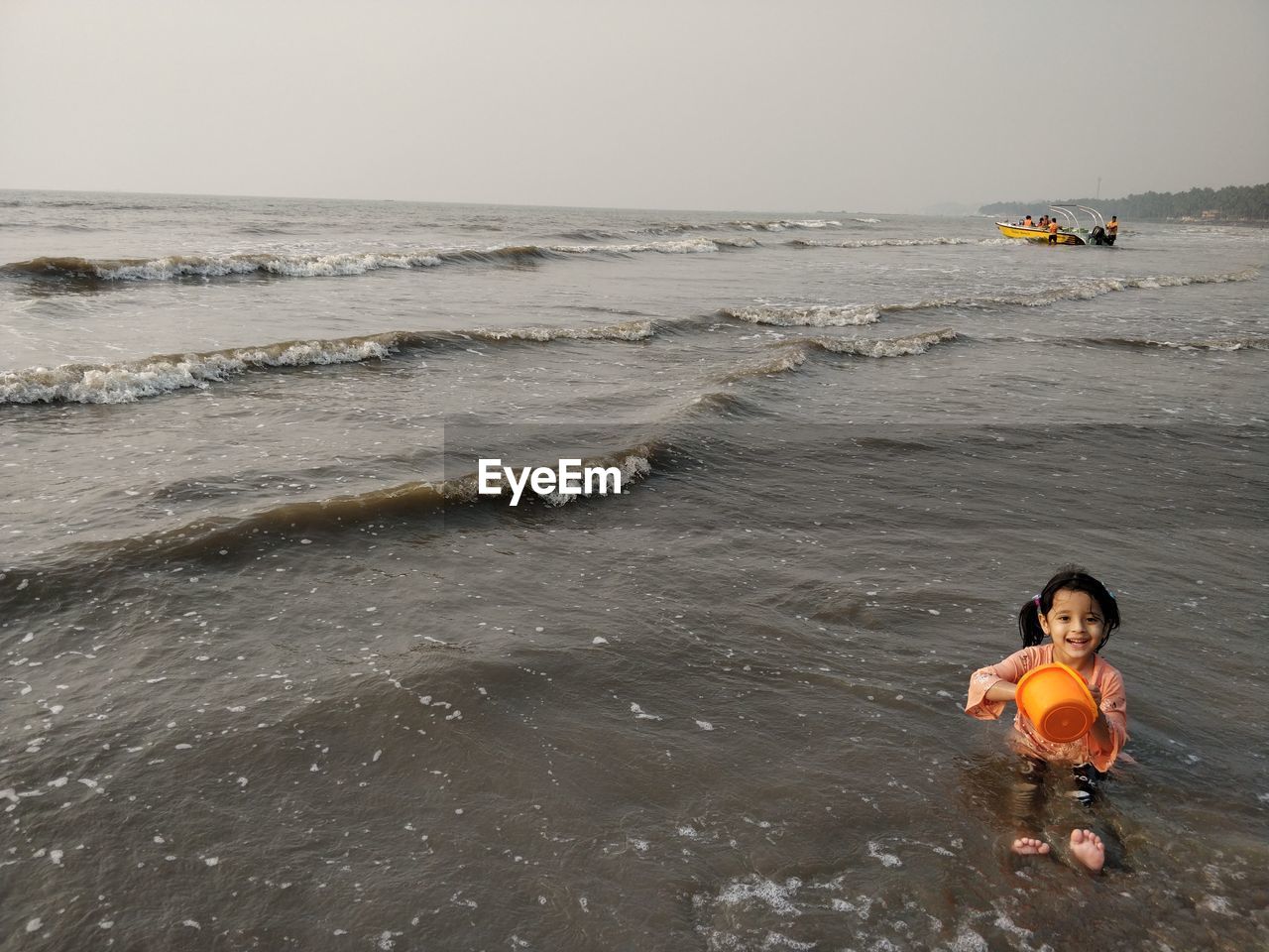 PORTRAIT OF BOY ON BEACH