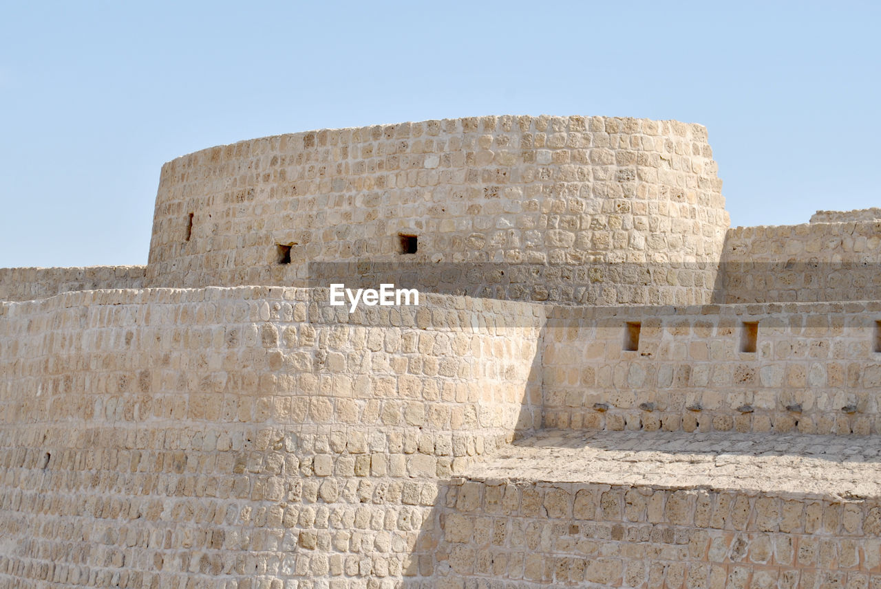 LOW ANGLE VIEW OF FORT AGAINST SKY