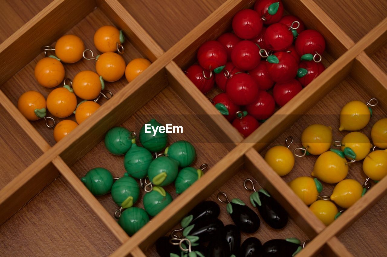 VARIOUS FRUITS IN BOX ON CRATE