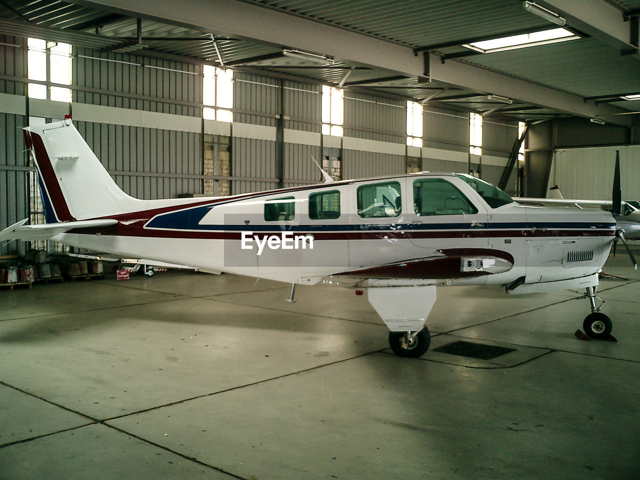 cropped image of airplane at airport