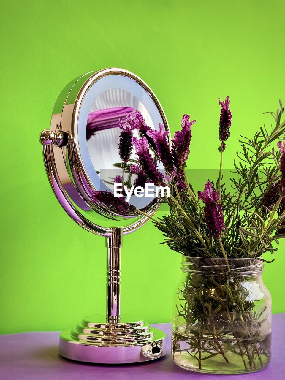 CLOSE-UP OF PURPLE FLOWERS IN VASE