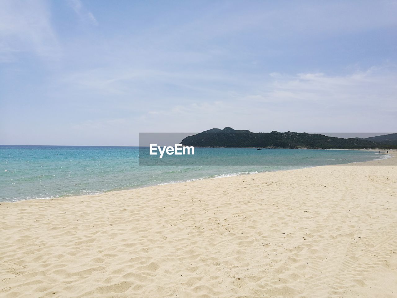 Scenic view of beach and sea against sky