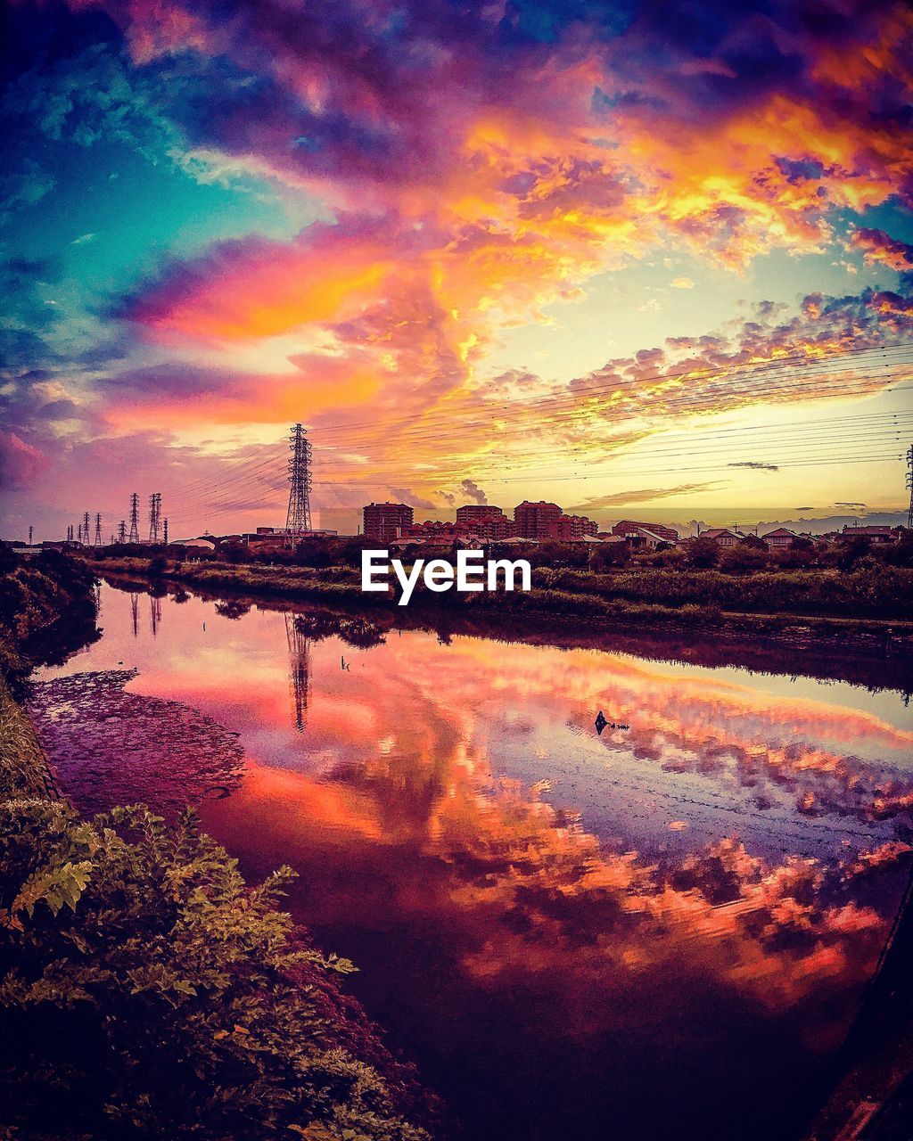 SCENIC VIEW OF SILHOUETTE BRIDGE AGAINST SKY AT SUNSET