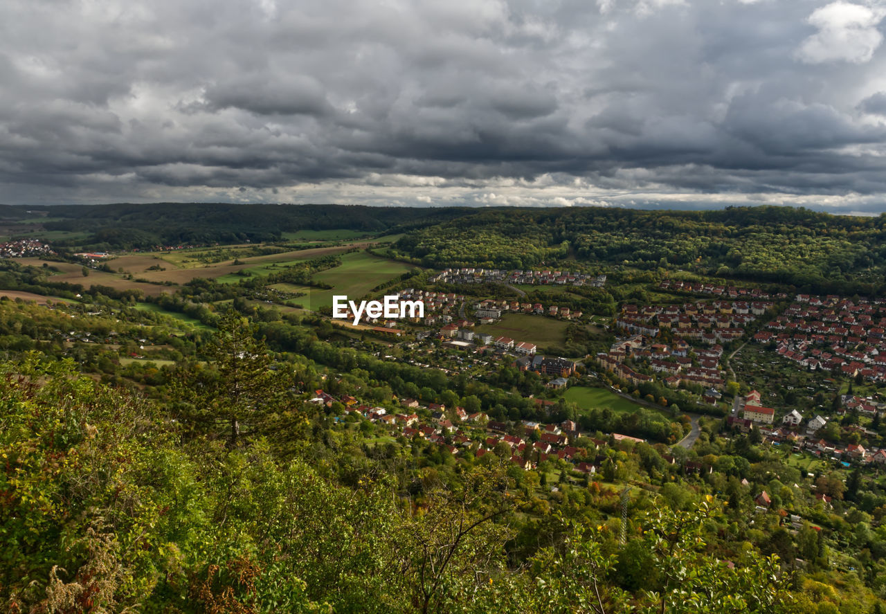 High angle view of agricultural landscape against sky