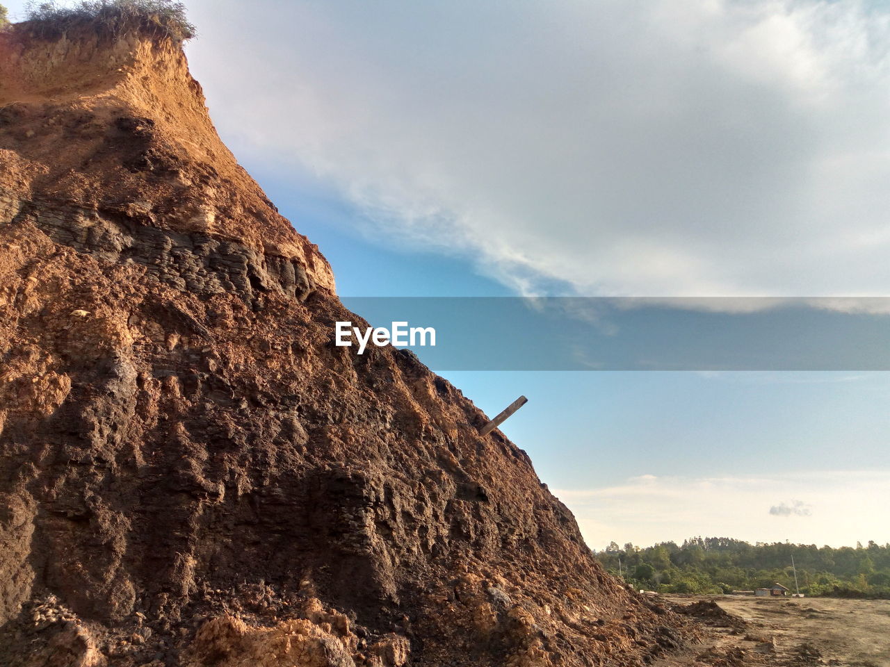 Low angle view of rock formations against sky