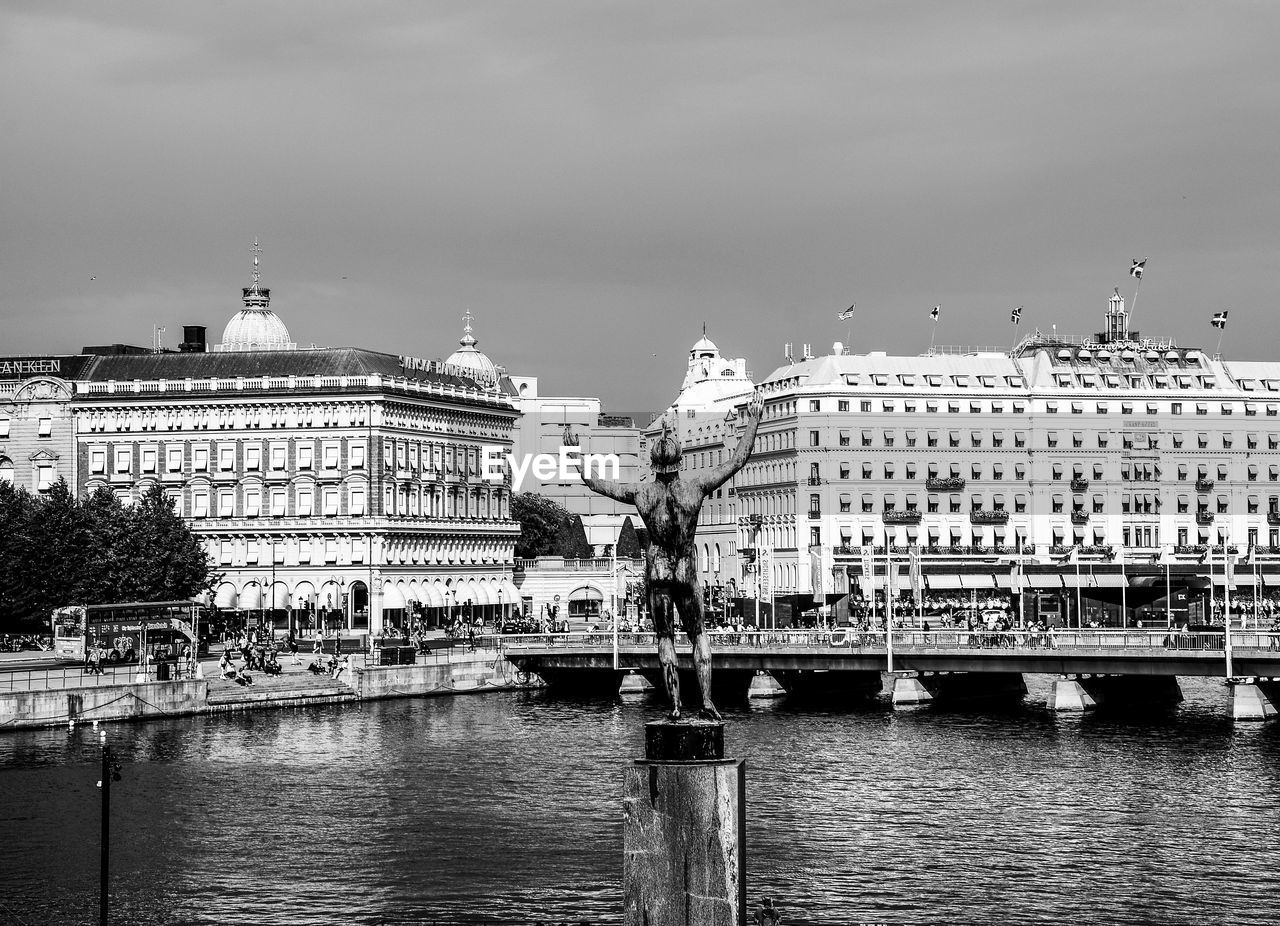 architecture, built structure, building exterior, water, cityscape, city, black and white, sky, travel destinations, monochrome, monochrome photography, river, nature, building, travel, transportation, urban area, cloud, no people, tourism, bridge, nautical vessel, government, mode of transportation, outdoors, reflection, waterfront, skyline, day, landmark, history, dock, the past