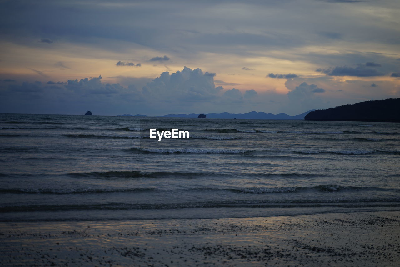 Scenic view of sea against sky during sunset