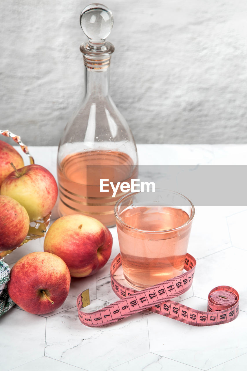 high angle view of fruits and drink on table