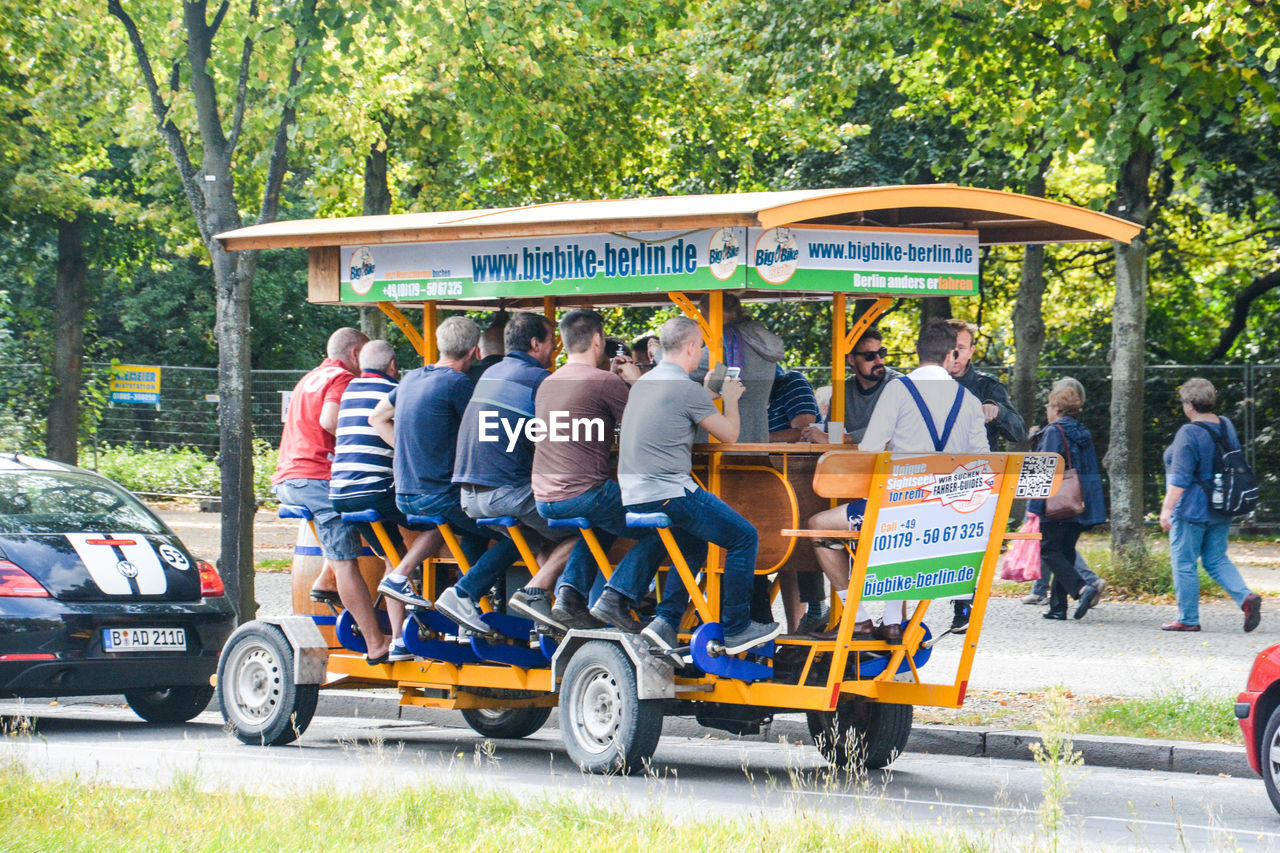 PEOPLE STANDING ON BUS