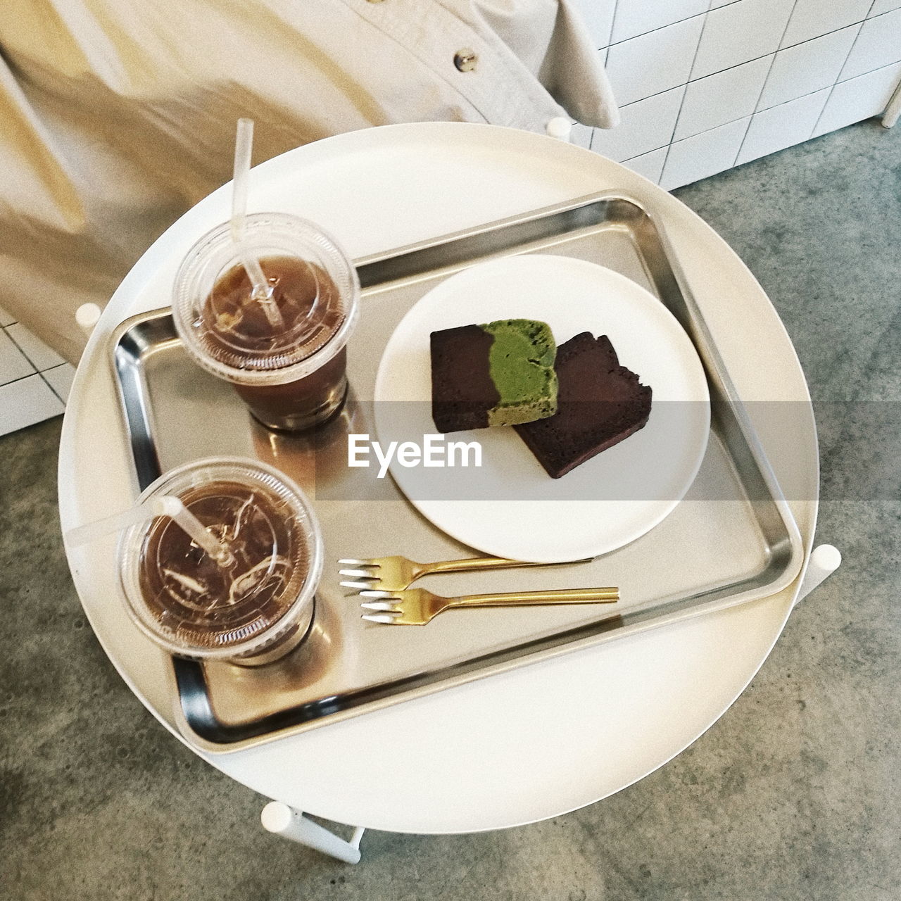 High angle view of food and drink in tray on table