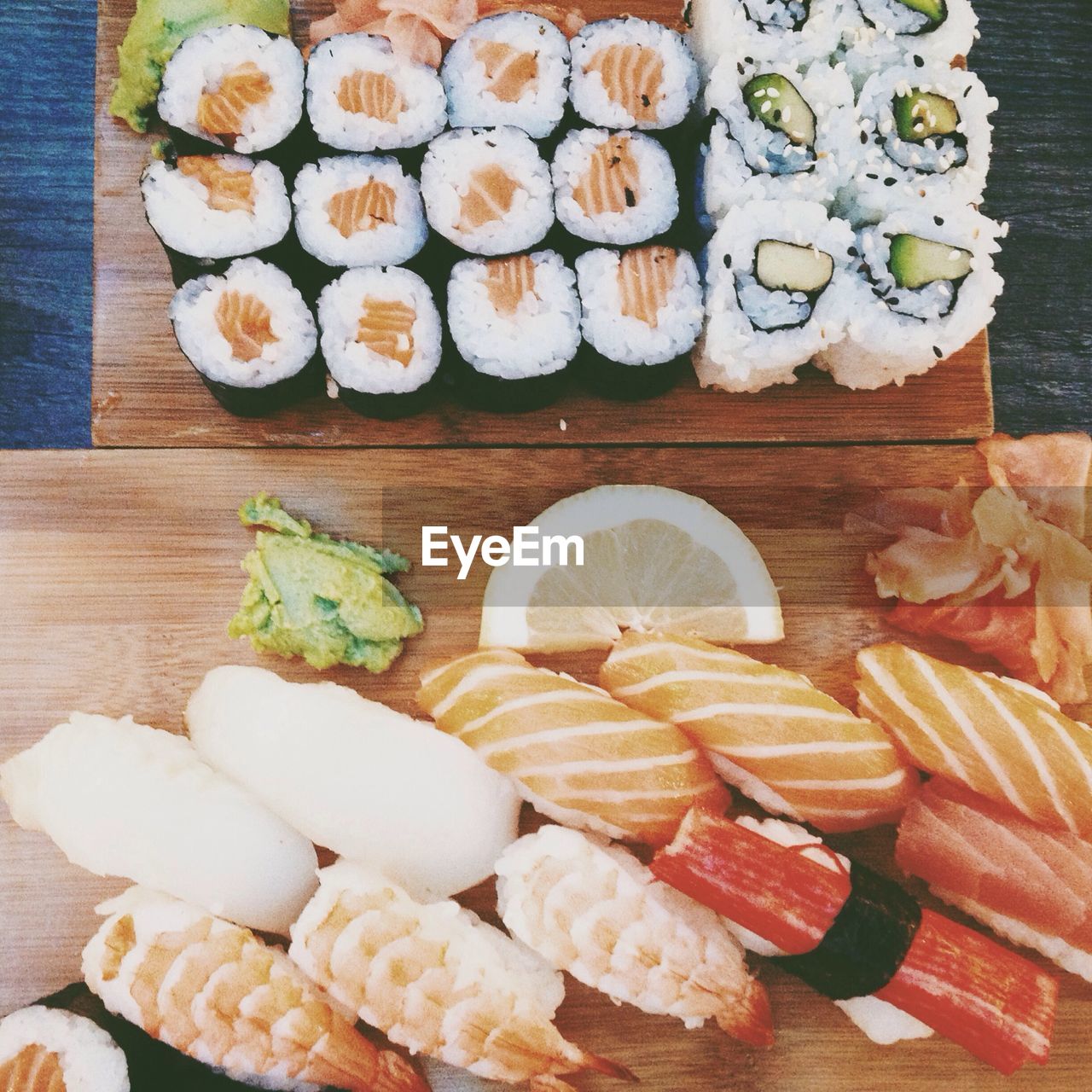 Various sushi on table