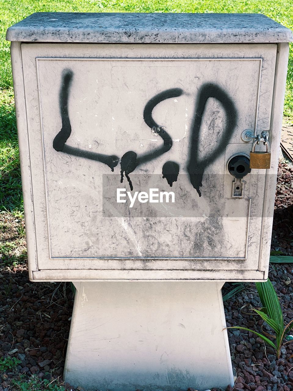 grave, headstone, day, mailbox, no people, sculpture, art, communication, nature, grass, plant, outdoors, text, creativity, waste container