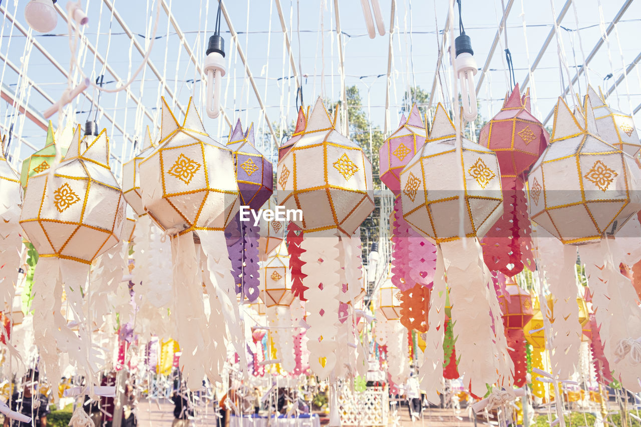 Low angle view of lanterns hanging outdoors