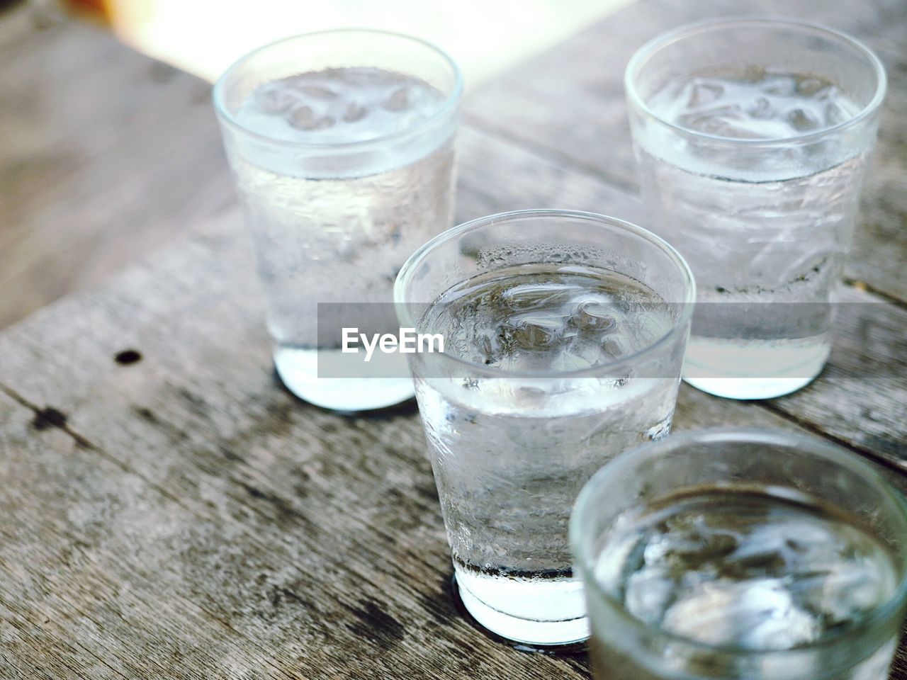 Drinking glasses on wooden table