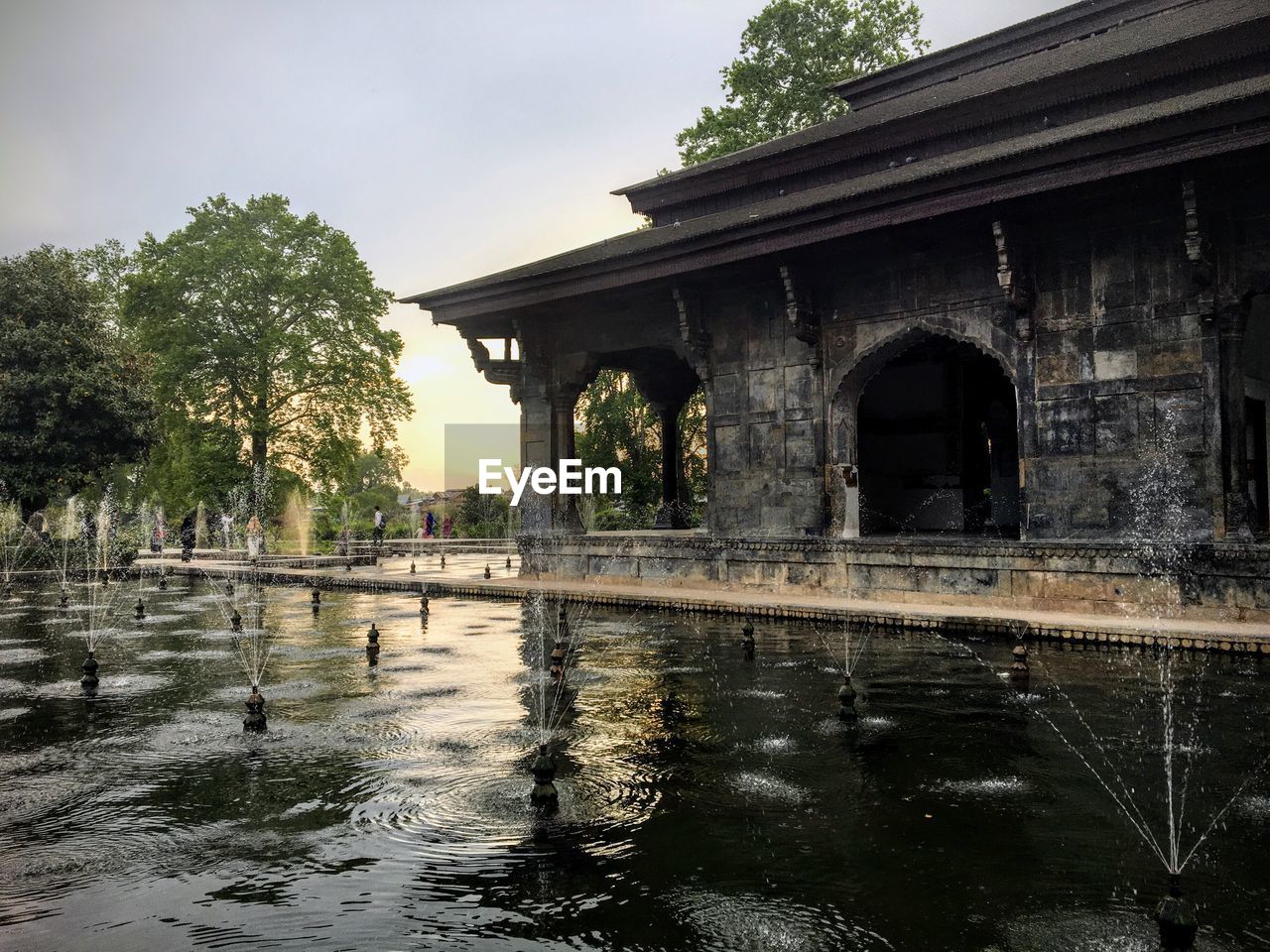 REFLECTION OF BUILDING IN WATER