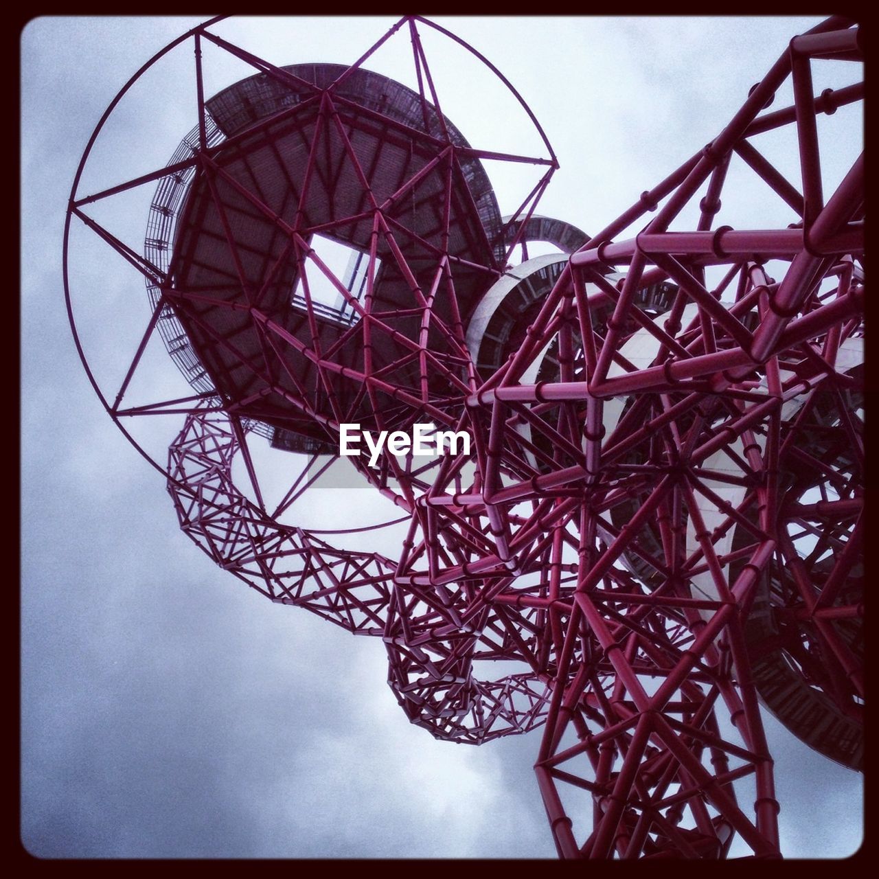 LOW ANGLE VIEW OF METALLIC STRUCTURE AGAINST SKY