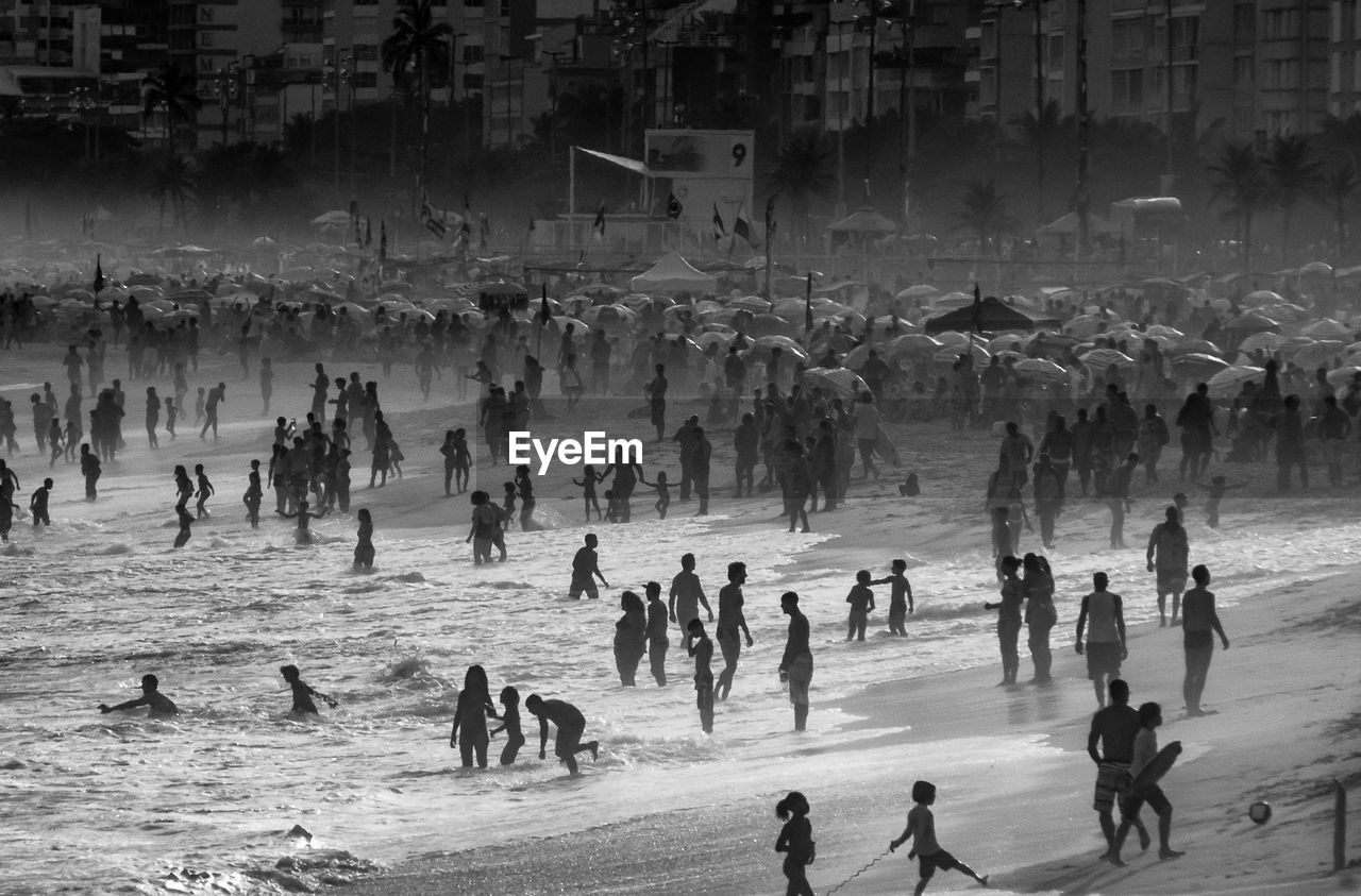 People enjoying at beach