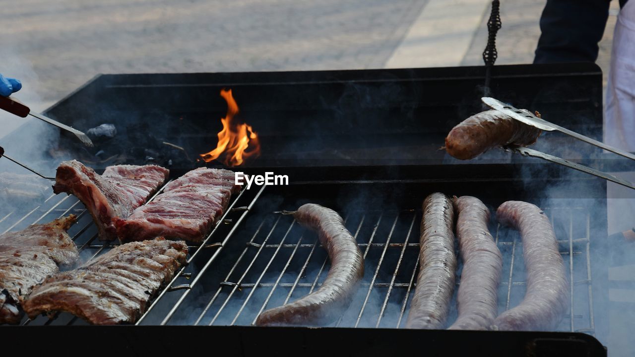 Close-up of meat on barbecue grill