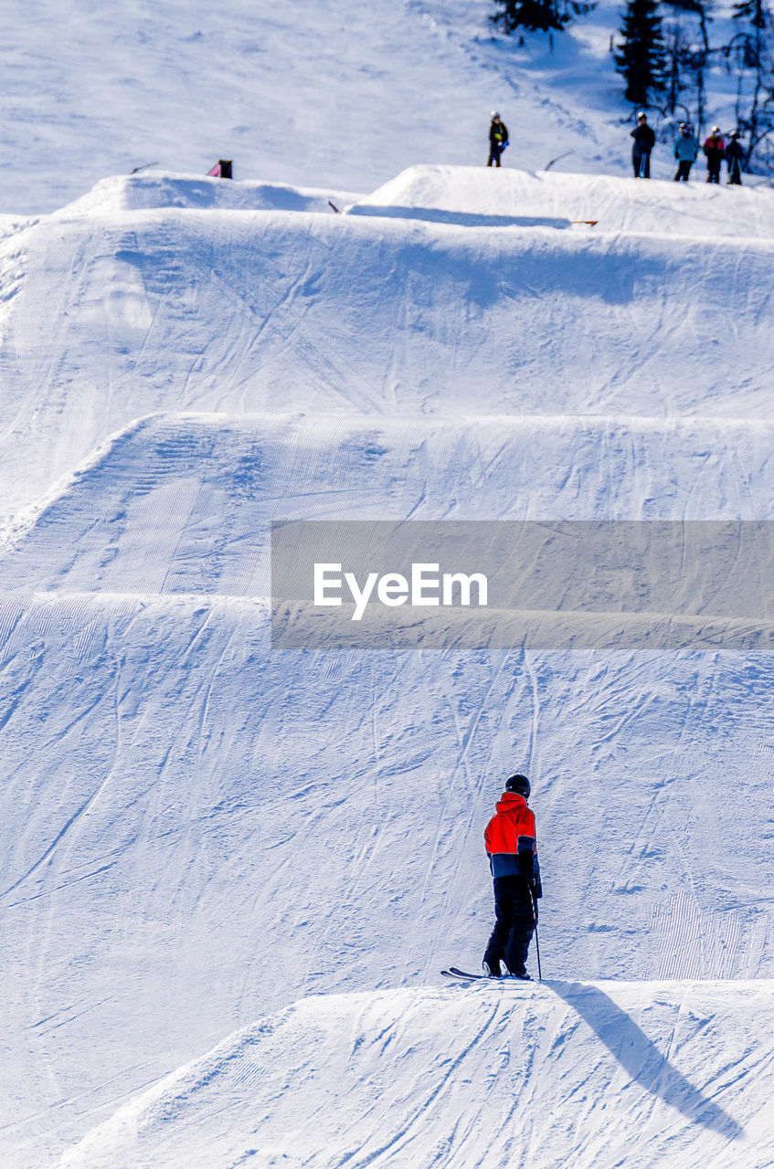 PEOPLE SKIING IN SNOW