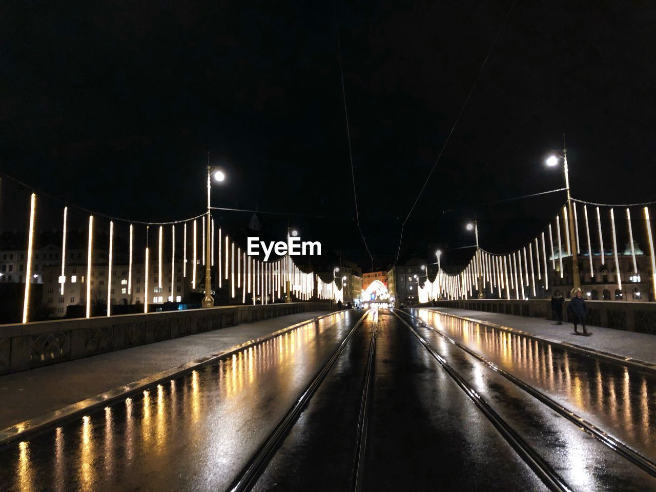 ILLUMINATED STREET AT NIGHT