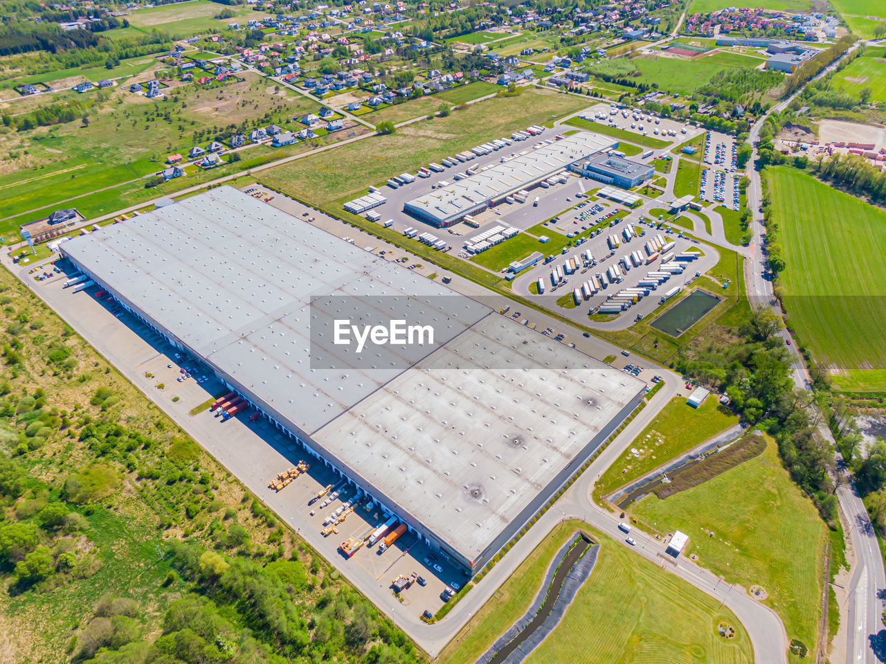 Aerial view of warehouse storages or industrial factory or logistics center from above. top view 