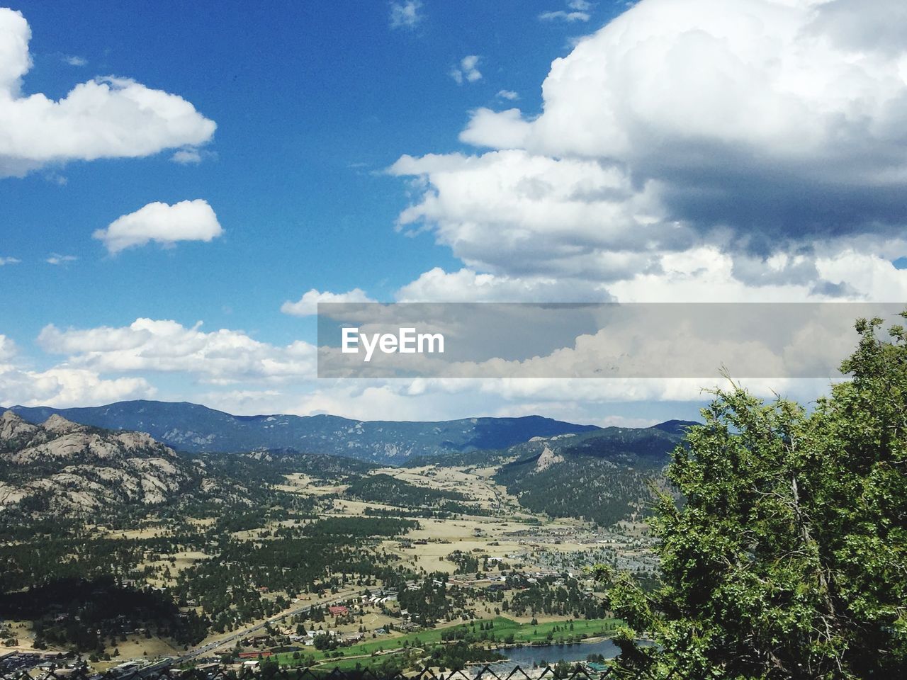 SCENIC VIEW OF TREE MOUNTAINS AGAINST SKY