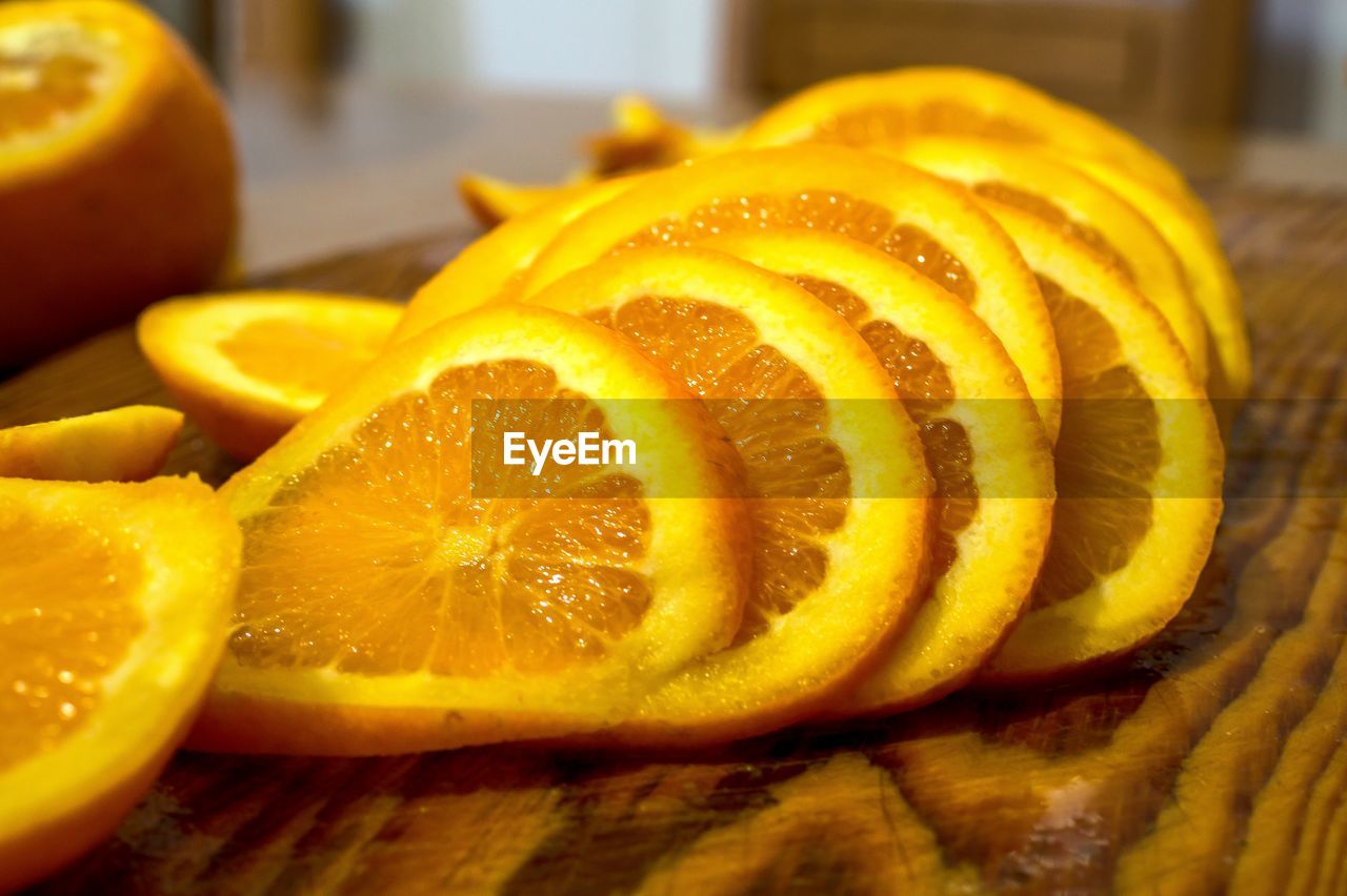 Close-up of orange slices on table