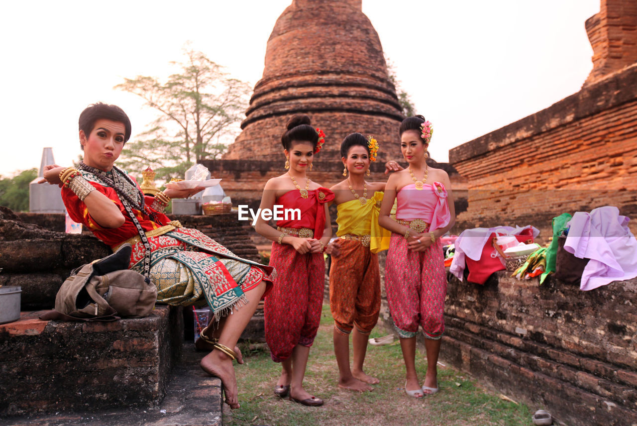 GROUP OF PEOPLE AGAINST TEMPLE