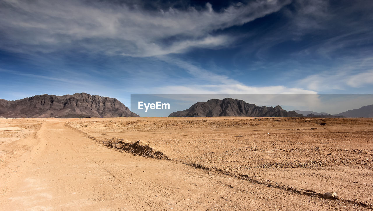 Desert with mountains. panorama of a desert in afghanistan with mountains in the background