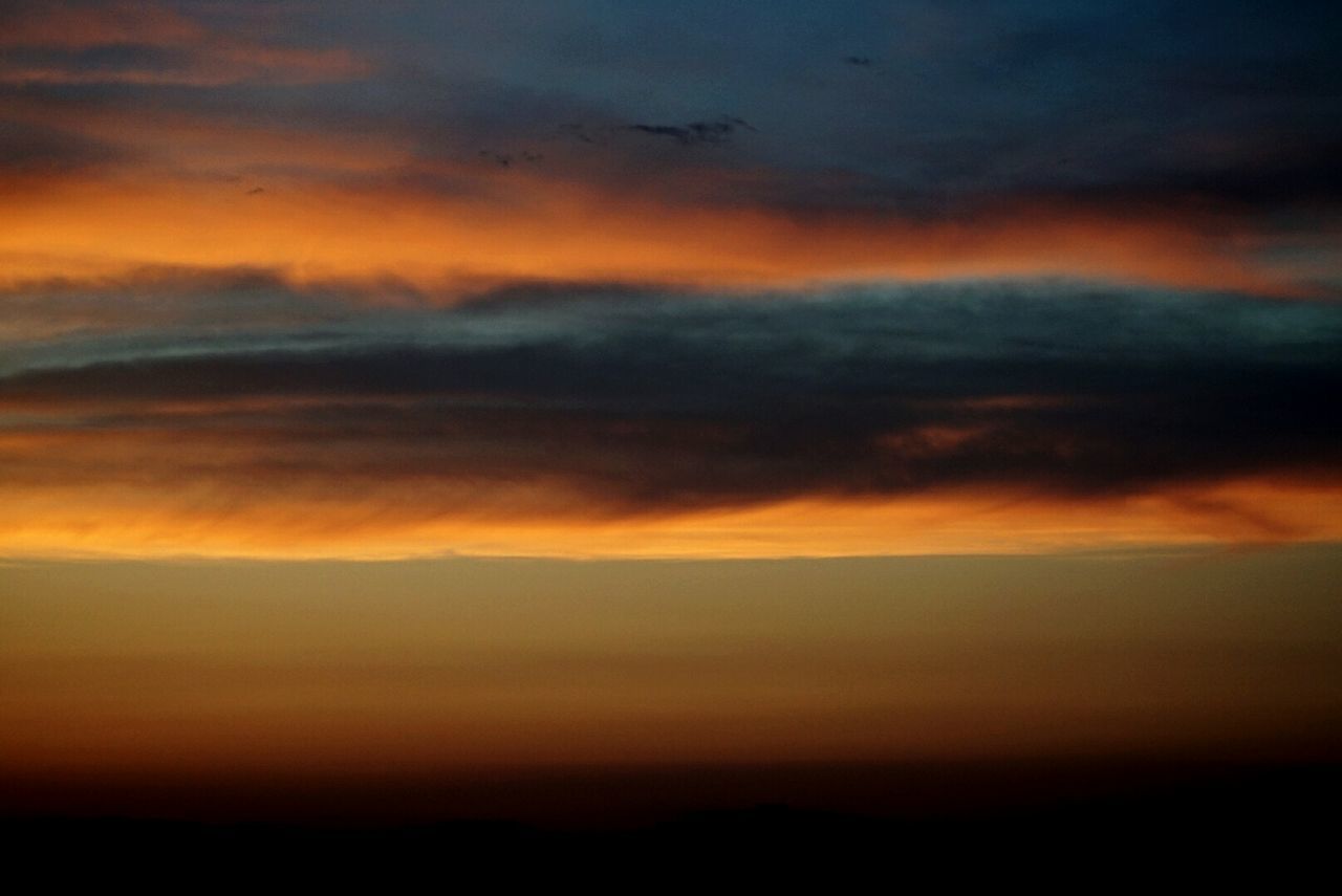 SCENIC VIEW OF DRAMATIC SKY DURING SUNSET