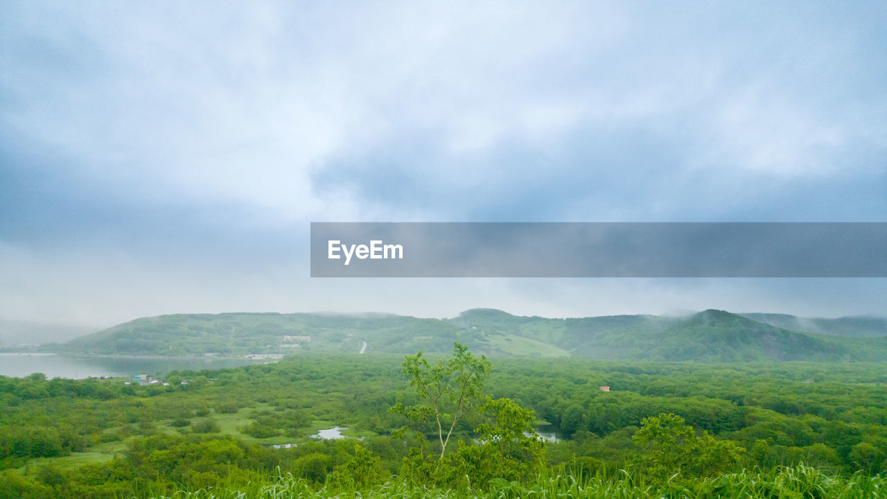 SCENIC VIEW OF LAND AGAINST SKY