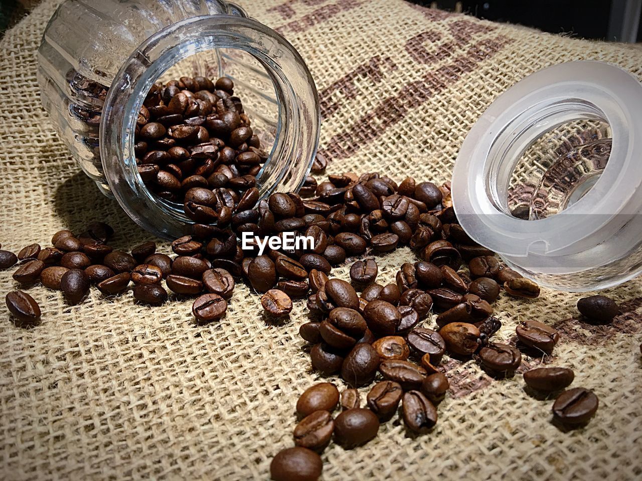 CLOSE-UP OF COFFEE BEANS IN CONTAINER