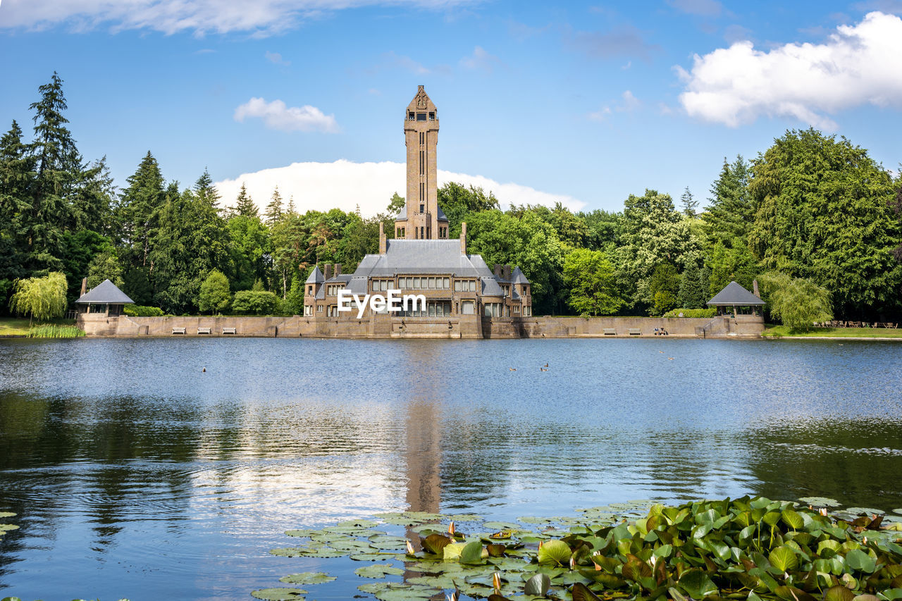 Hoge veluwe, netherlands, june 2020 view on lake and kroller-muller house jachthuis sint hubertus