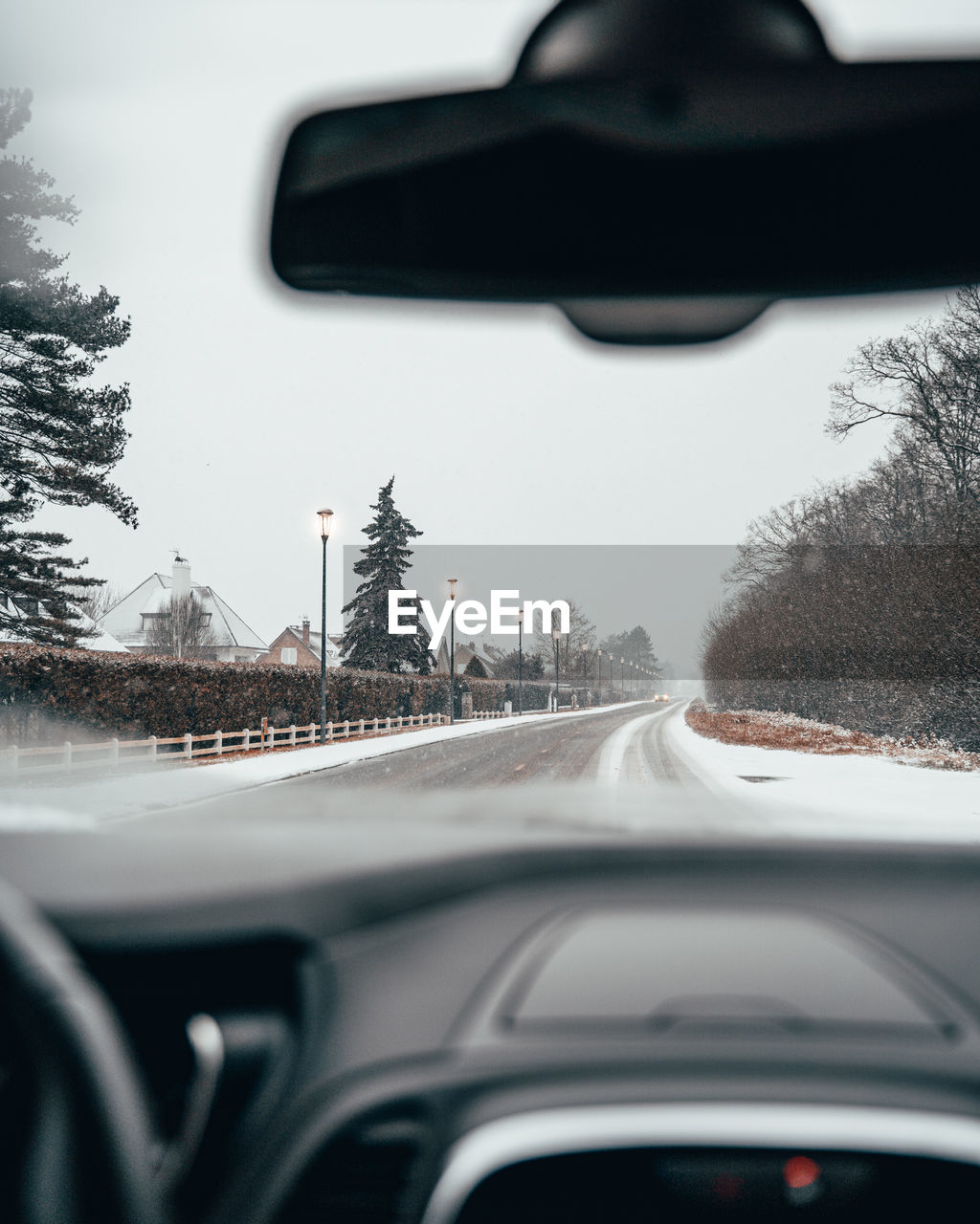 ROAD SEEN THROUGH WINDSHIELD