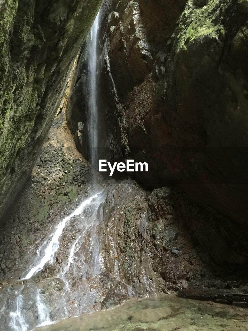 WATER FLOWING THROUGH ROCKS