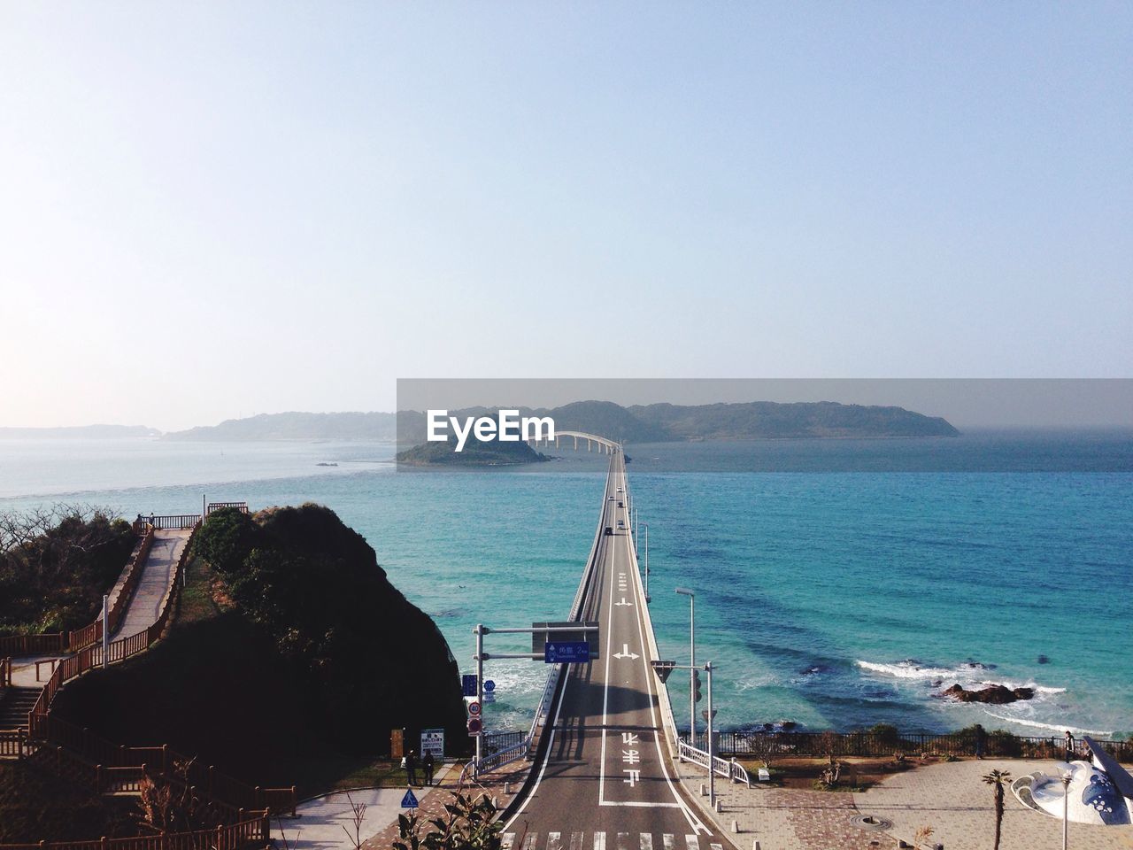 Tsunoshima ohashi bridge over sea against clear sky