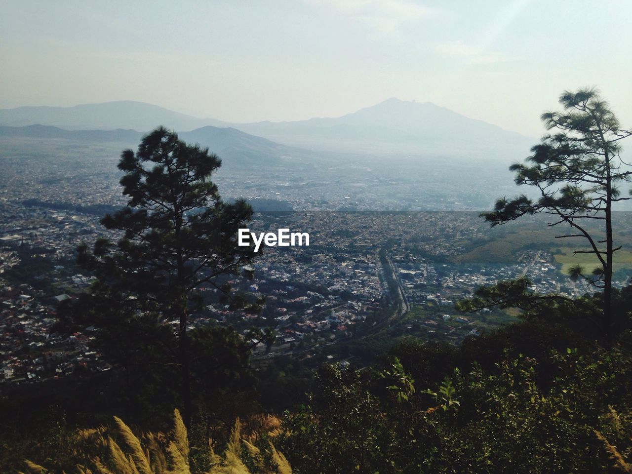 Scenic view of cityscape against sky