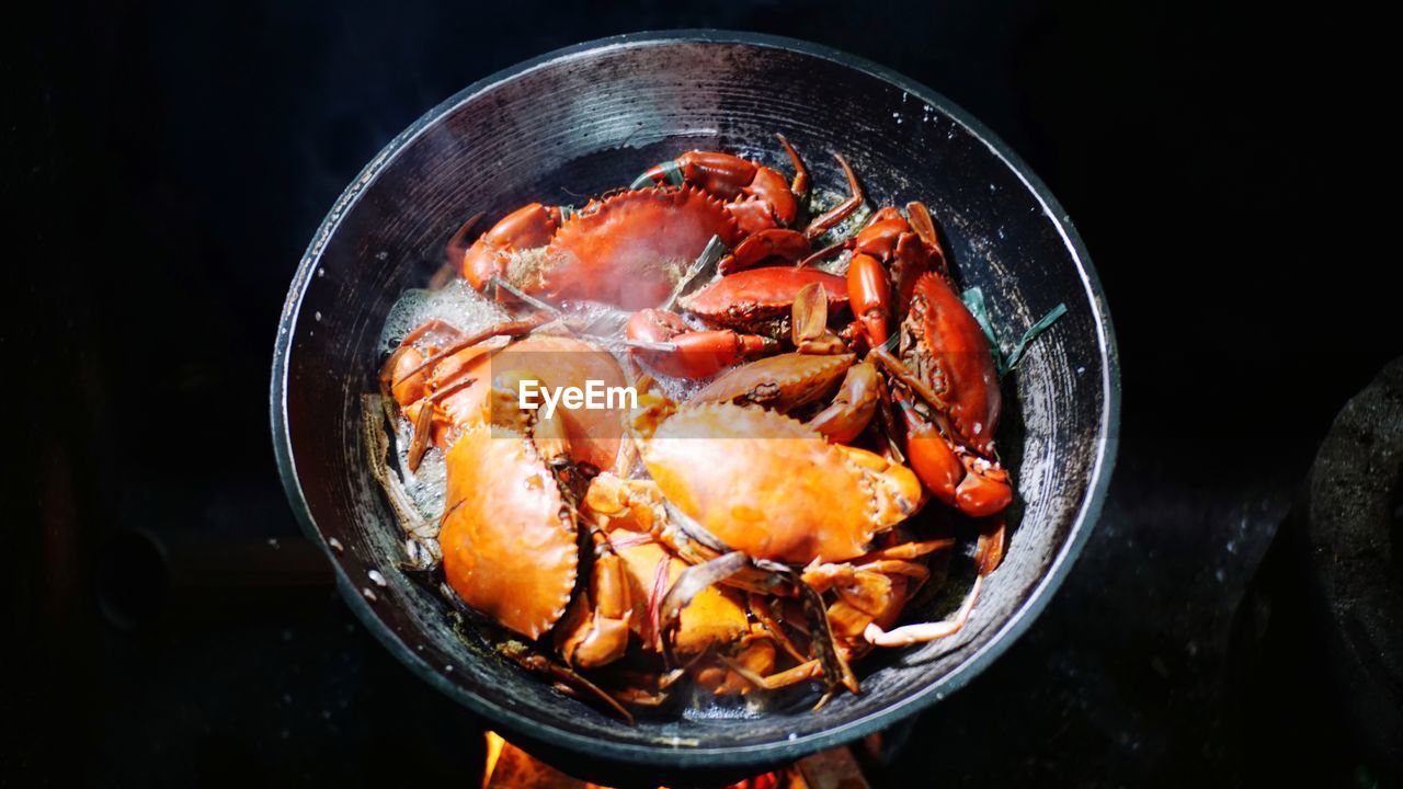High angle view of mud crab in cooking pan