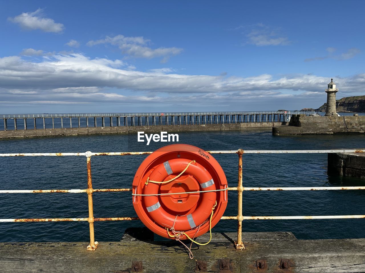 water, lifebuoy, sky, sea, security, protection, nature, life belt, cloud, railing, ocean, coast, no people, architecture, day, buoy, nautical vessel, transportation, outdoors, beach, built structure, vacation, blue, rope, land, vehicle, shore, sunlight, pier, scenics - nature, beauty in nature, travel destinations, metal, guidance