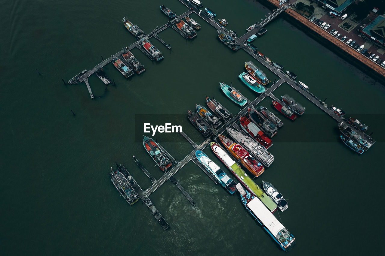 High angle view of ship moored at harbor