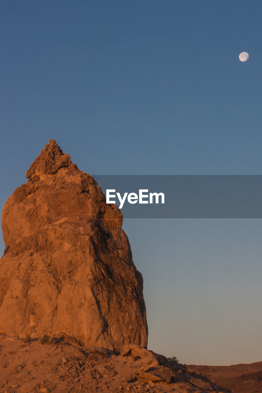 Scenic view of desert against clear sky