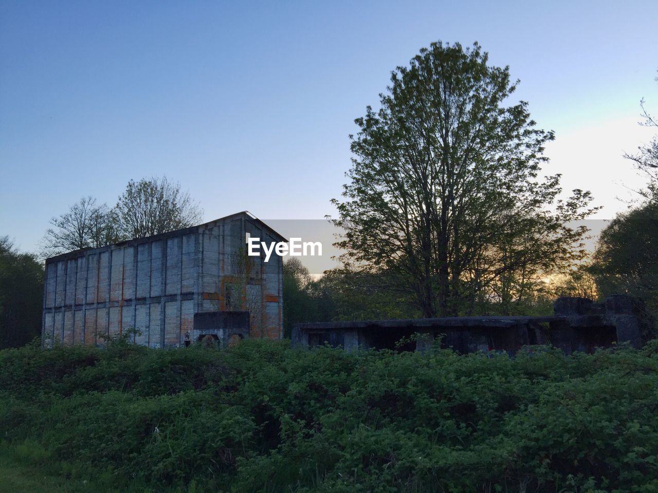 Abandoned building against clear sky