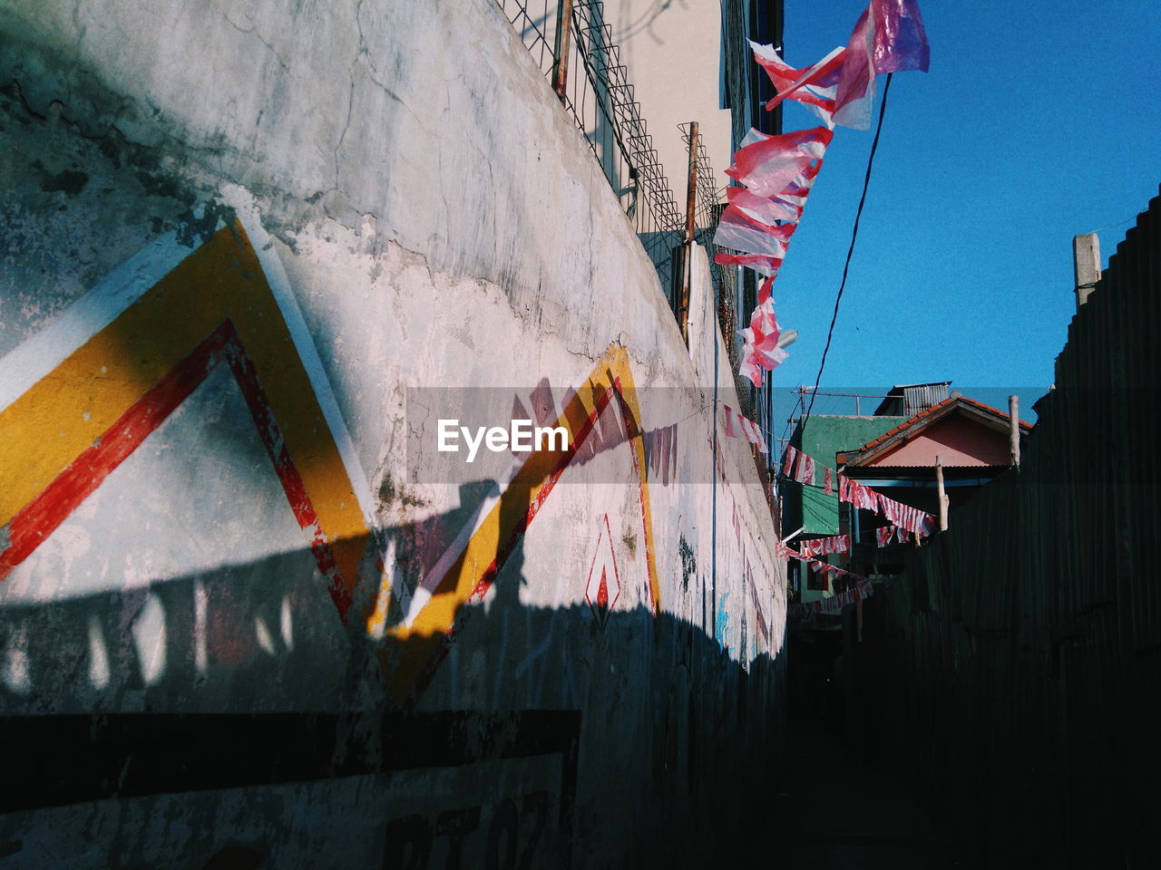 Narrow alley amidst houses