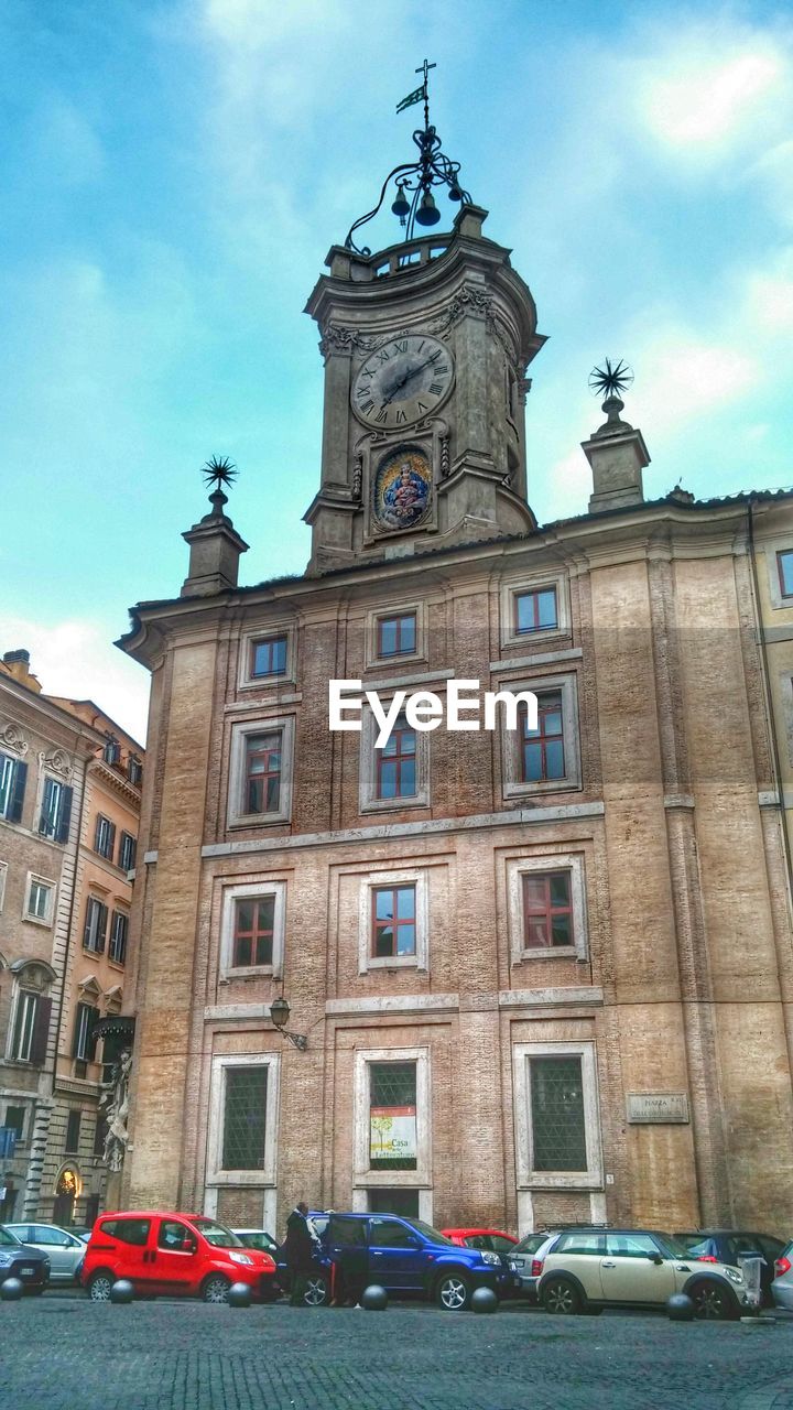 Facade of la maison dellorologio against sky