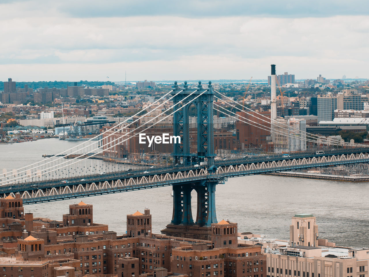 High angle view of suspension bridge in city