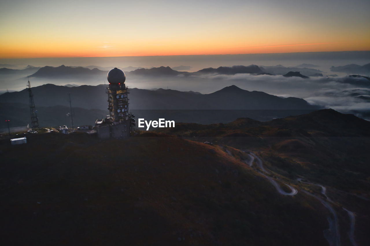 Scenic view of mountains against sky during sunset