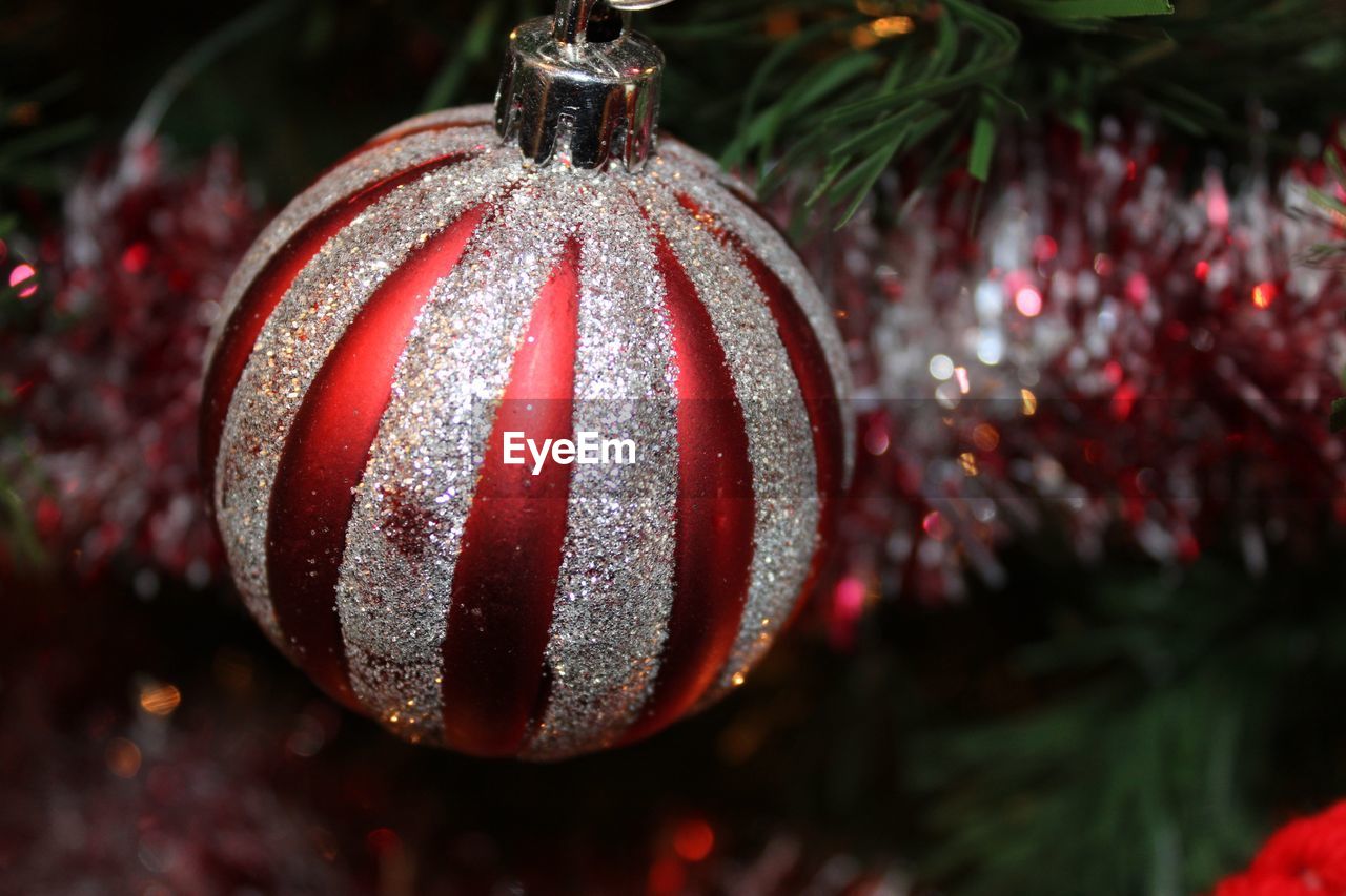 Close-up of christmas decoration hanging on tree