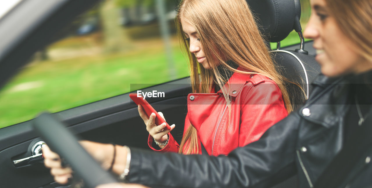 Young woman using mobile phone